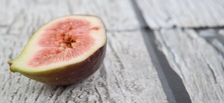 Fig fruits over wooden backgroundの写真素材