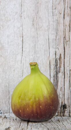 Fig fruits over wooden backgroundの写真素材