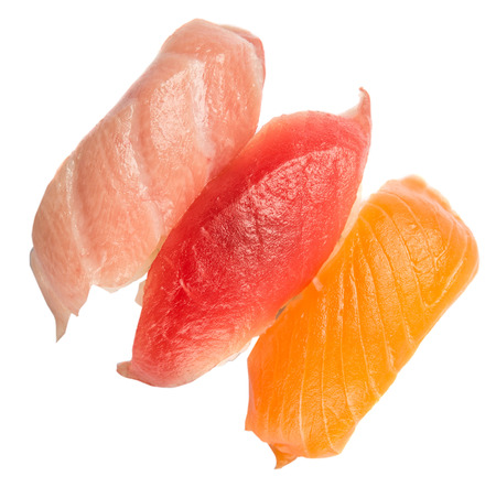 Japanese otoro sushi, red tuna sushi and salmon sushi over white backgroundの写真素材