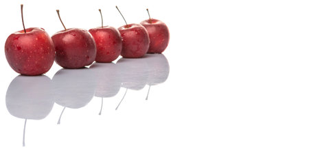 Crab apple fruit over white backgroundの写真素材