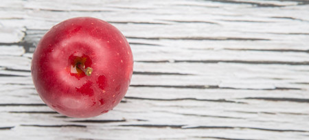 Crab apple fruit over wooden backgroundの写真素材