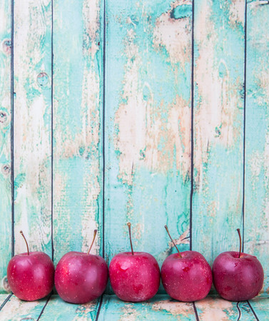 Crab apple fruit over wooden backgroundの写真素材