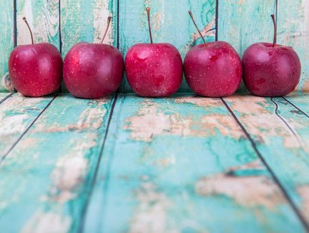 Crab apple fruit over wooden backgroundの写真素材