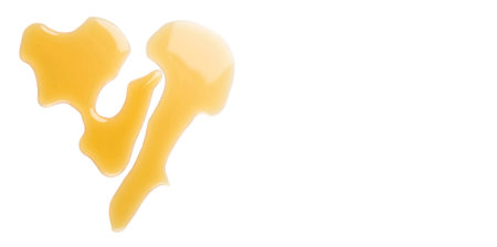 Maple syrup over white backgroundの写真素材