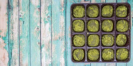 Japanes confection daifuku or glutinuos rice with sweet filings over wooden backgroundの写真素材