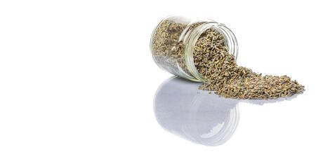 Dried lavender herb tea in mason jar over white backgroundの写真素材