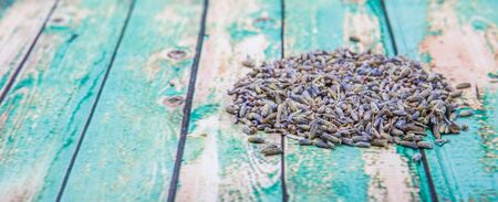 Dried lavender herbal tea over wooden backgroundの写真素材