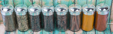 Spices variety over wooden background