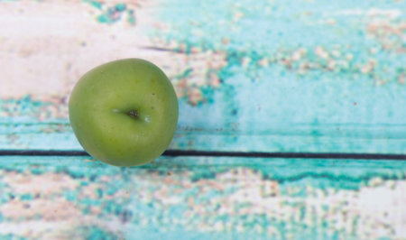 Pickled olive over wooden backgroundの写真素材