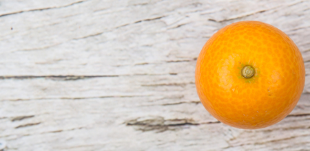 Kumquat fruit over wooden backgroundの写真素材