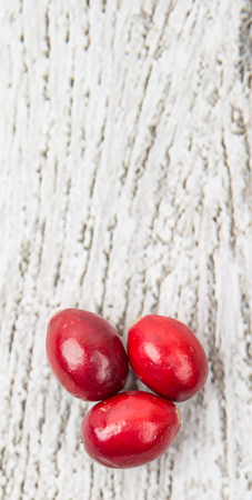 Cranberries fruit over wooden backgroundの写真素材