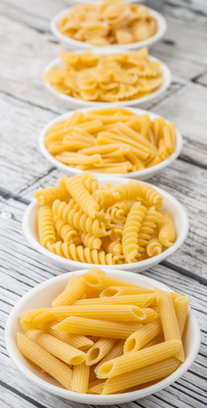 Various dried pasta variety and shapesの写真素材