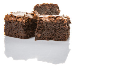 Homemade chocolate brownies over white backgroundの写真素材