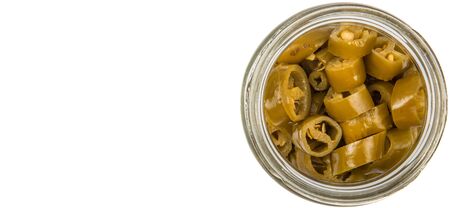 Pickled chili in white bowl over white backgroundの写真素材