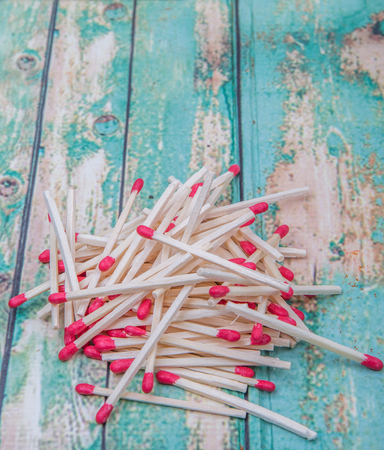 Matchsticks over wooden backgroundの写真素材