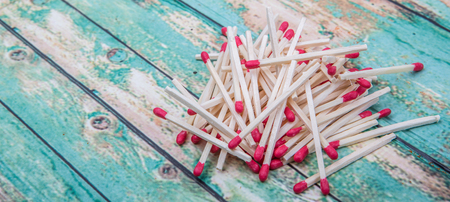 Matchsticks over wooden backgroundの写真素材