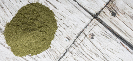 Peppermint herbs powder over wooden backgroundの写真素材