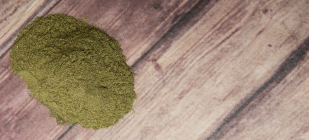 Peppermint herbs powder over wooden backgroundの写真素材