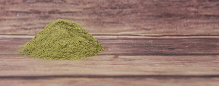 Peppermint herbs powder over wooden backgroundの写真素材