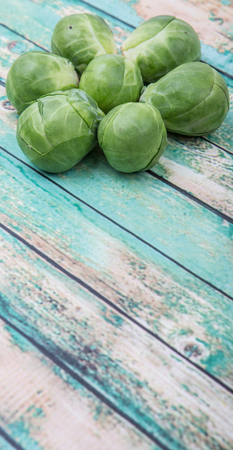 Brussels sprout over wooden backgroundの写真素材