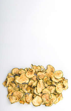 Dried zucchini or courgette  over white backgroundの写真素材