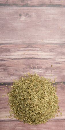 Dried tarragon herb over wooden backgroundの写真素材