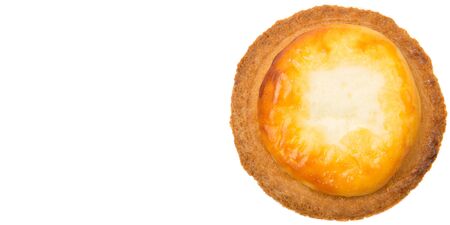 Homemade Japanese cheese tart over white backgroundの写真素材