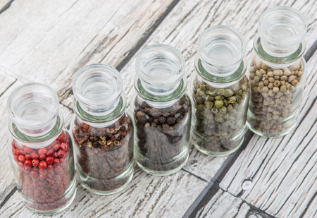 Szechuan peppercorns, green peppercorns, white peppercorns, black peppercorns and pink peppercorns...