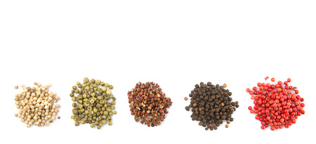 Mix peppercorn variety over white backgroundの写真素材