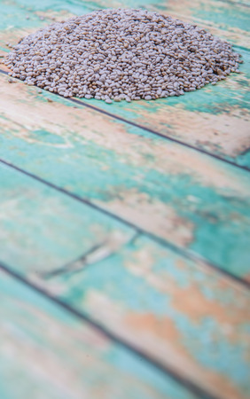 White chia seed over wooden backgroundの写真素材