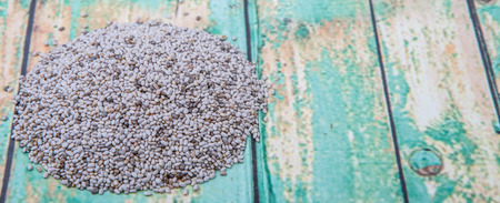 White chia seed over wooden backgroundの写真素材