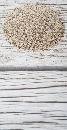 White chia seed over wooden backgroundの写真素材