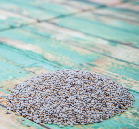 White chia seed over wooden backgroundの写真素材