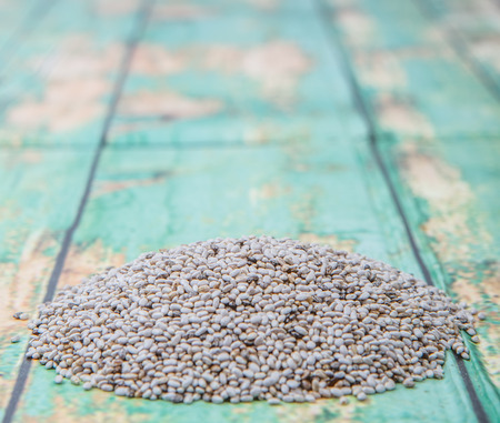 White chia seed over wooden backgroundの写真素材