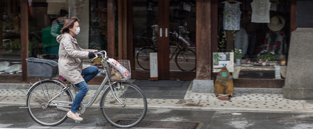Kawagoe, Saitama, Japan - 9th April 2016. Locals and tourists in Kawagoe town. Originating from Japan's Edo Period, Kawagoe town is also known as Little Edo.のeditorial素材