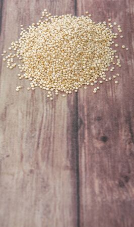 White quinoa grain over wooden backgroundの写真素材