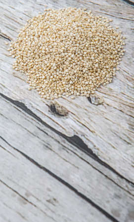 White quinoa grain over wooden backgroundの写真素材