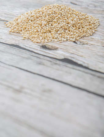 White quinoa grain over wooden backgroundの写真素材