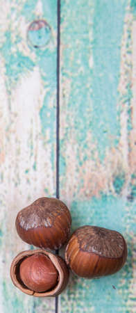 Hazelnuts on wooden backgroundの写真素材
