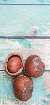 Hazelnuts on wooden backgroundの写真素材