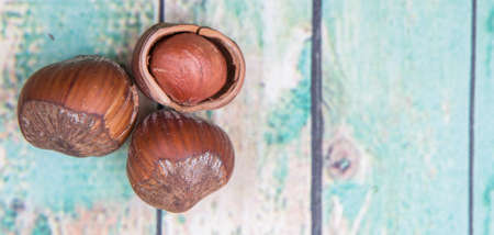 Hazelnuts on wooden backgroundの写真素材