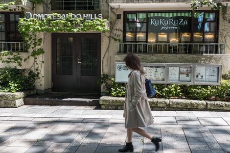TOKYO, JAPAN - MAY 3RD, 2016. Tourists and locals walking in Omotesando, an upscale shopping...