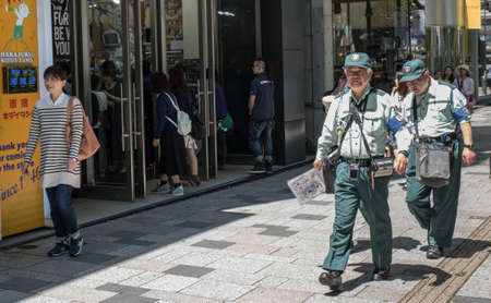 TOKYO, JAPAN - MAY 3RD, 2016. Tourists and locals walking in Omotesando, an upscale shopping...
