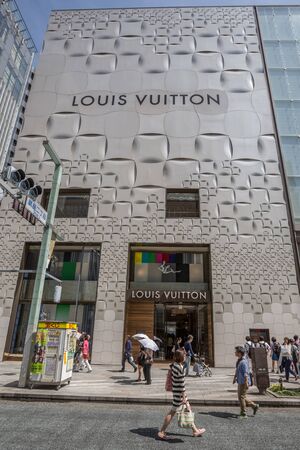GINZA,TOKYO, JAPAN - MAY 6TH, 2016. Tourists and locals walking in Ginza Street, an upscale and...