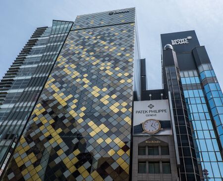 GINZA,TOKYO, JAPAN - MAY 6TH, 2016. Tourists and locals walking in Ginza Street, an upscale and popular shopping district in Tokyo.のeditorial素材