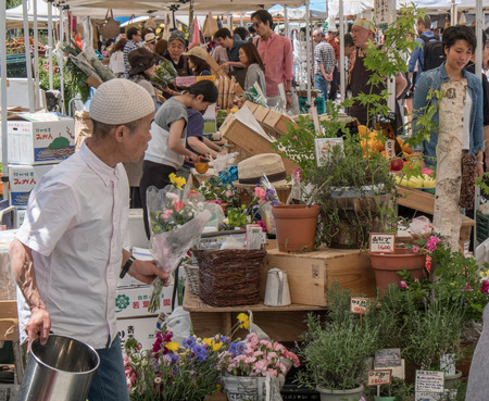 TOKYO, JAPAN - MAY 7TH, 2016. Weekly held local farmer's market at United Nations University, Tokyo, Japan.のeditorial素材