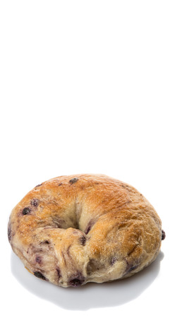 Homemade blueberry bagel over white backgroundの写真素材