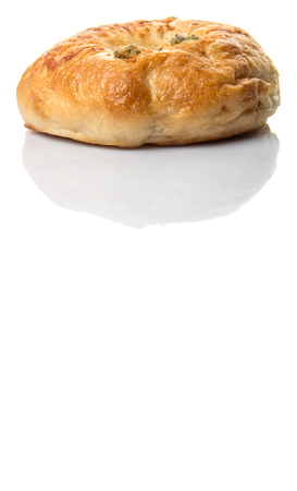 Homemade cream cheese filled bagel over white backgroundの写真素材