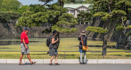 TOKYO, JAPAN - MAY 21ST, 2016. Tourists and locals at the Tokyo Imperial Palace groundsのeditorial素材