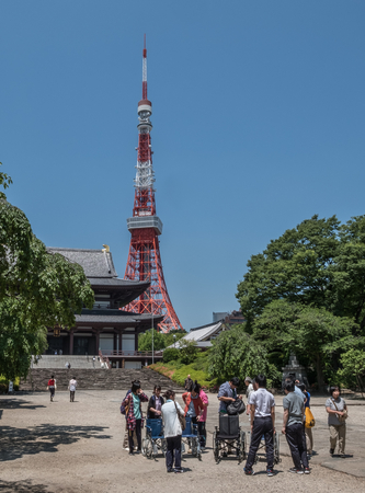 TOKYO, JAPAN - JUNE 2ND 2016. View of Tokyo Tower and Zojoji Temple. Tokyo Tower is a communications and observation tower located in Minato, Tokyo, Japan.のeditorial素材
